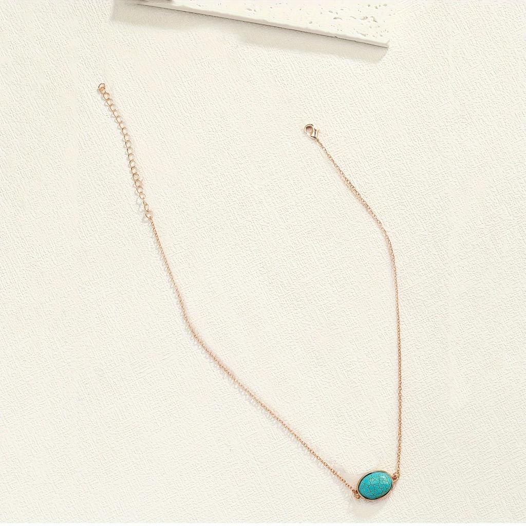 A golden yellow chain peacock blue explosion pattern stone pendant necklace collarbone chain fashionable and elegant vacation style