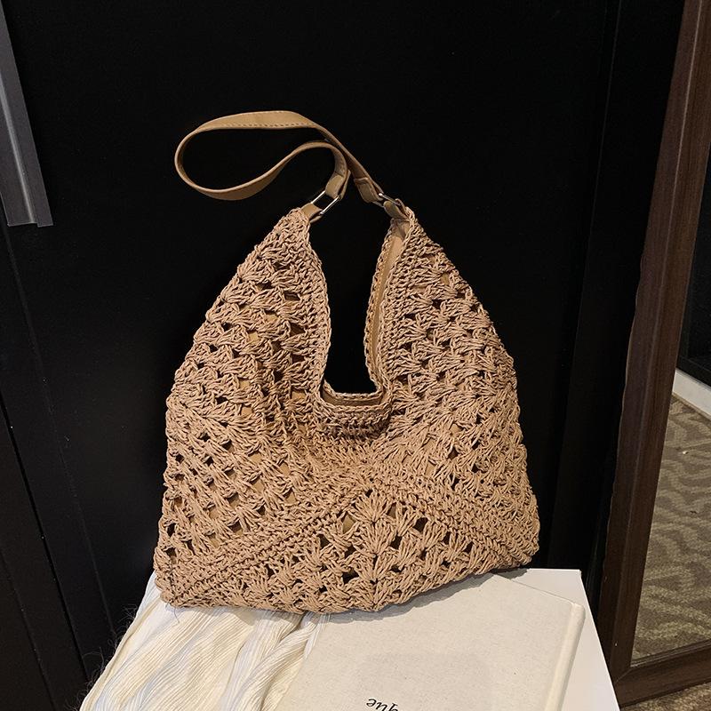 Hohle gewebte Strohtasche Damen große Kapazität neu Sommer Schulter Pendeln Badeurlaub Strandtasche