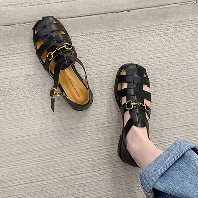 

Leather Roman sandals women s hollow 2025 summer new beach shoes woven horse buckle retro one-word buckle cool slippers 40