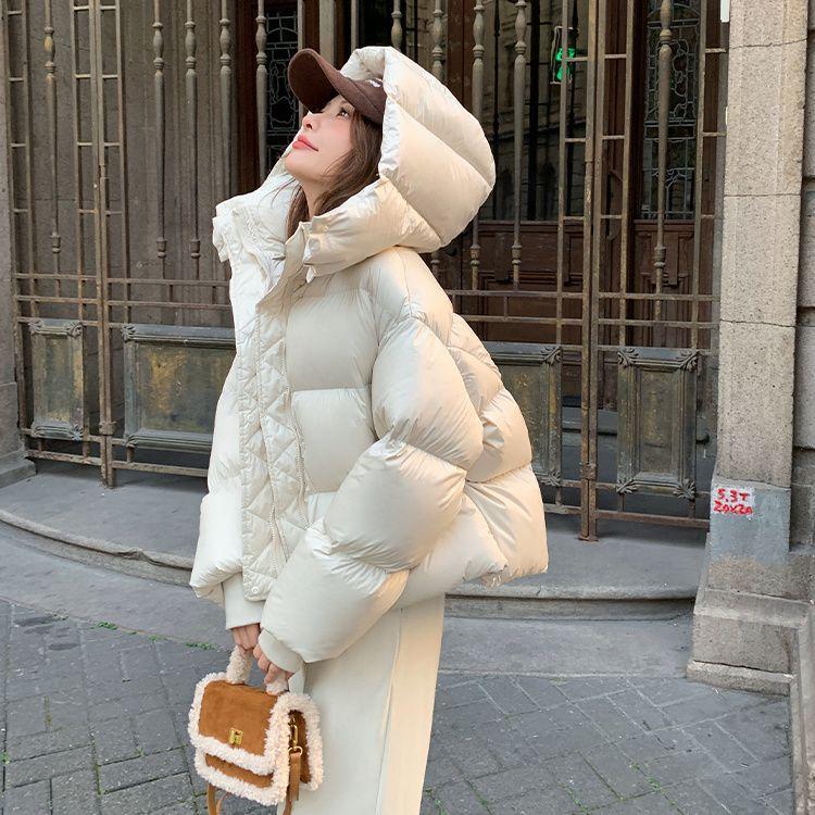 Giacca in Piuma con Cappuccio Nuova Invernale Donna Versione Coreana Ispessita Larga Temperamento Giacca a Pane