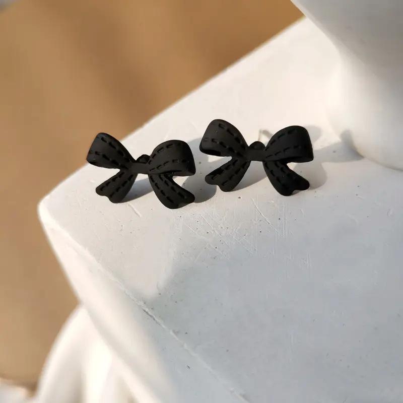 Sweet and simple temperament Super fairy bow stud earrings New earrings Tide alloy