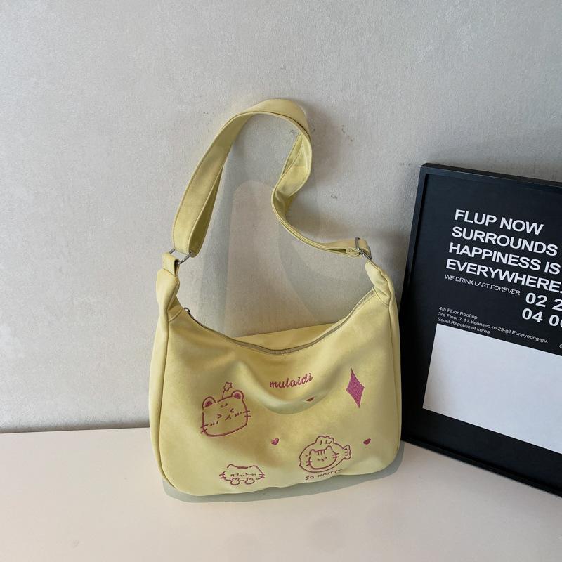 2025 new Korean version of casual niche design tote bag, student class commute fashion soft leather shoulder messenger bag