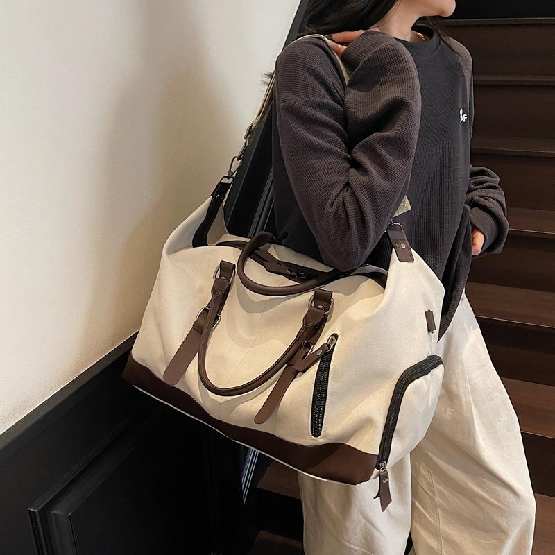 Retro Canvas Duffel Bag with Buckle Straps Large Capacity Travel Weekend Carry On Bag
