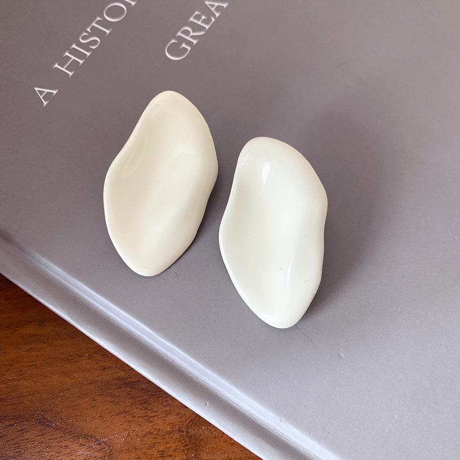 

Silver needle dripping oil irregular oval pendant earrings Hong Kong style fashion stud earrings women s simple earrings design sense niche