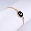 Pulsera Redonda de Acero Inoxidable 18K Europea con Letra para Mujer - Joyería de Mano Moderna y Elegante