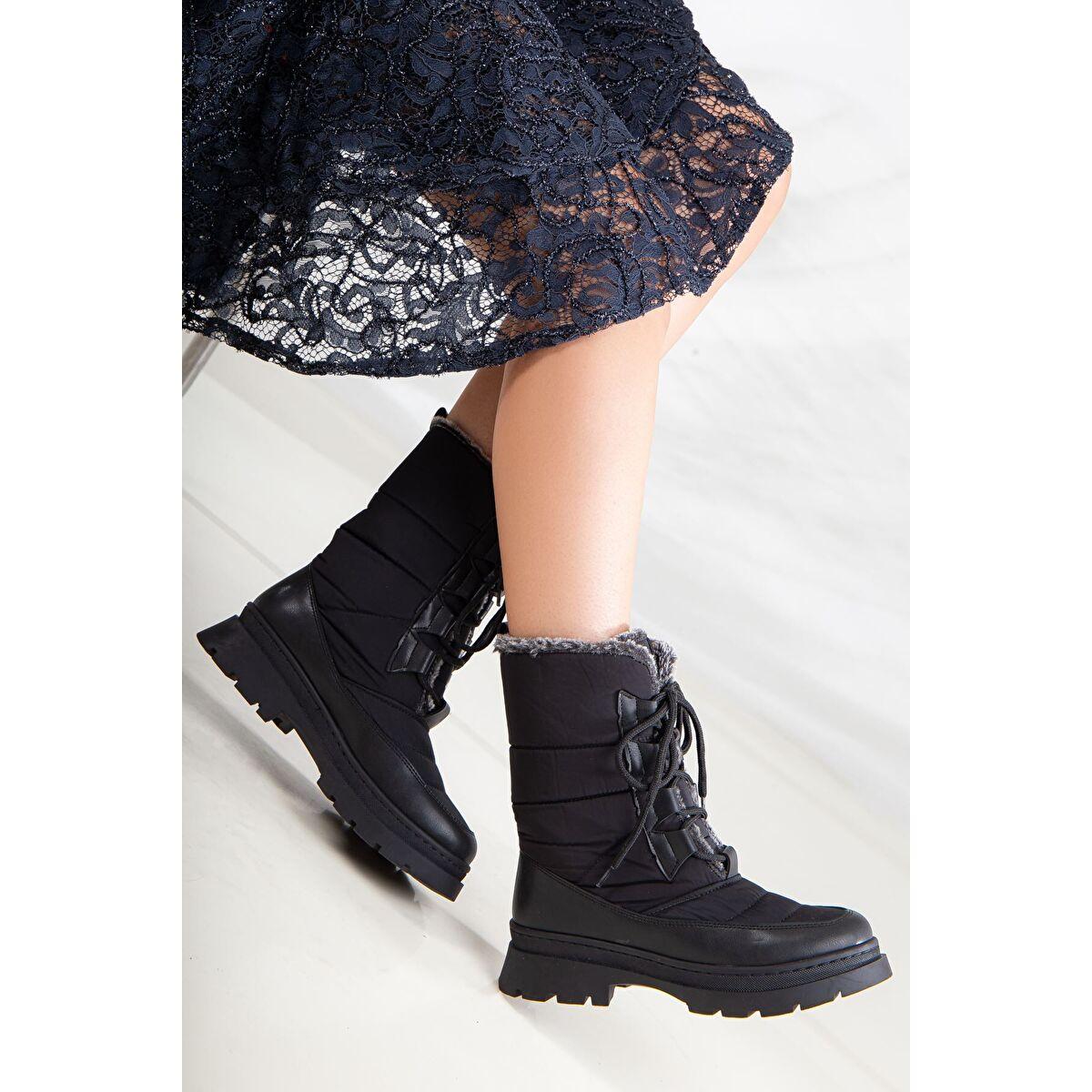 

Женские сапоги Grant Bagcik с меховой отделкой, черная кожа