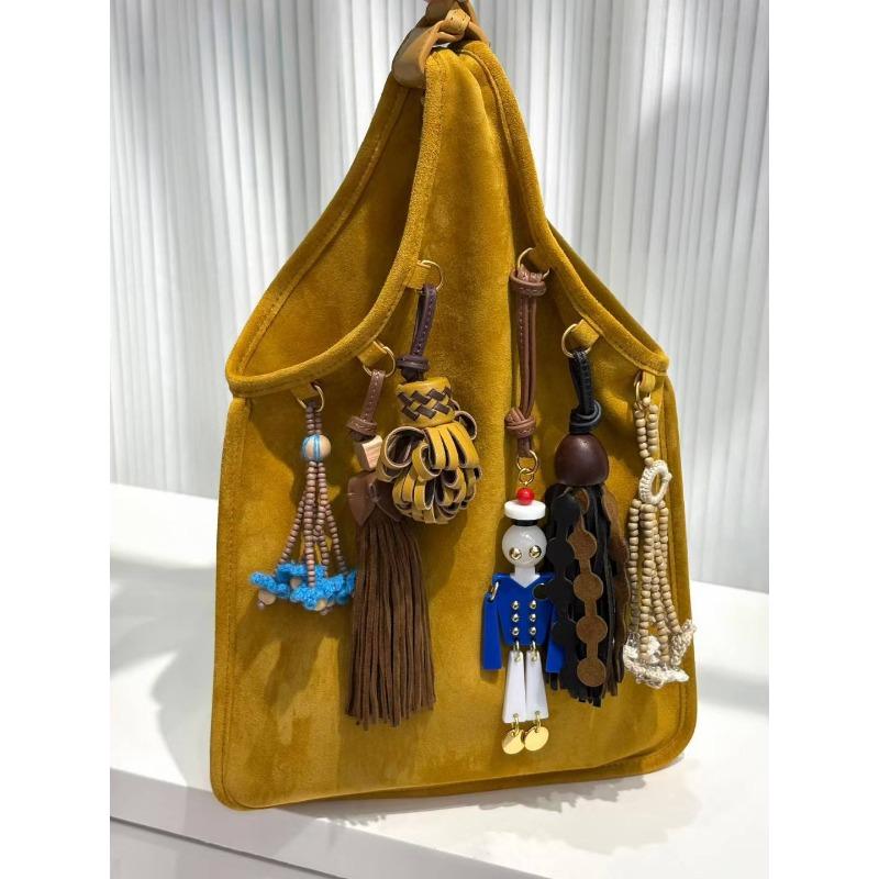 

Сумка из замши из коровьей кожи первого слоя, женская новая персонализированная сумка с бахромой, сумка на плечо, сумка-мессенджер, нишевая дизайнерская сумка Length 23 * Height 39cm светло-коричневого