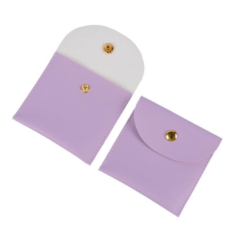 Leather Jewelry Storage Pouch: Dustproof Snap Button Bag for Necklace, Ring, Earring with Print Logo