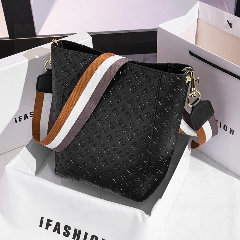 New Women's Bag Fashionable Versatile Embossed Solid Color Bucket Bag High-end Wide Shoulder Strap Commuter Shoulder Messenger Bag