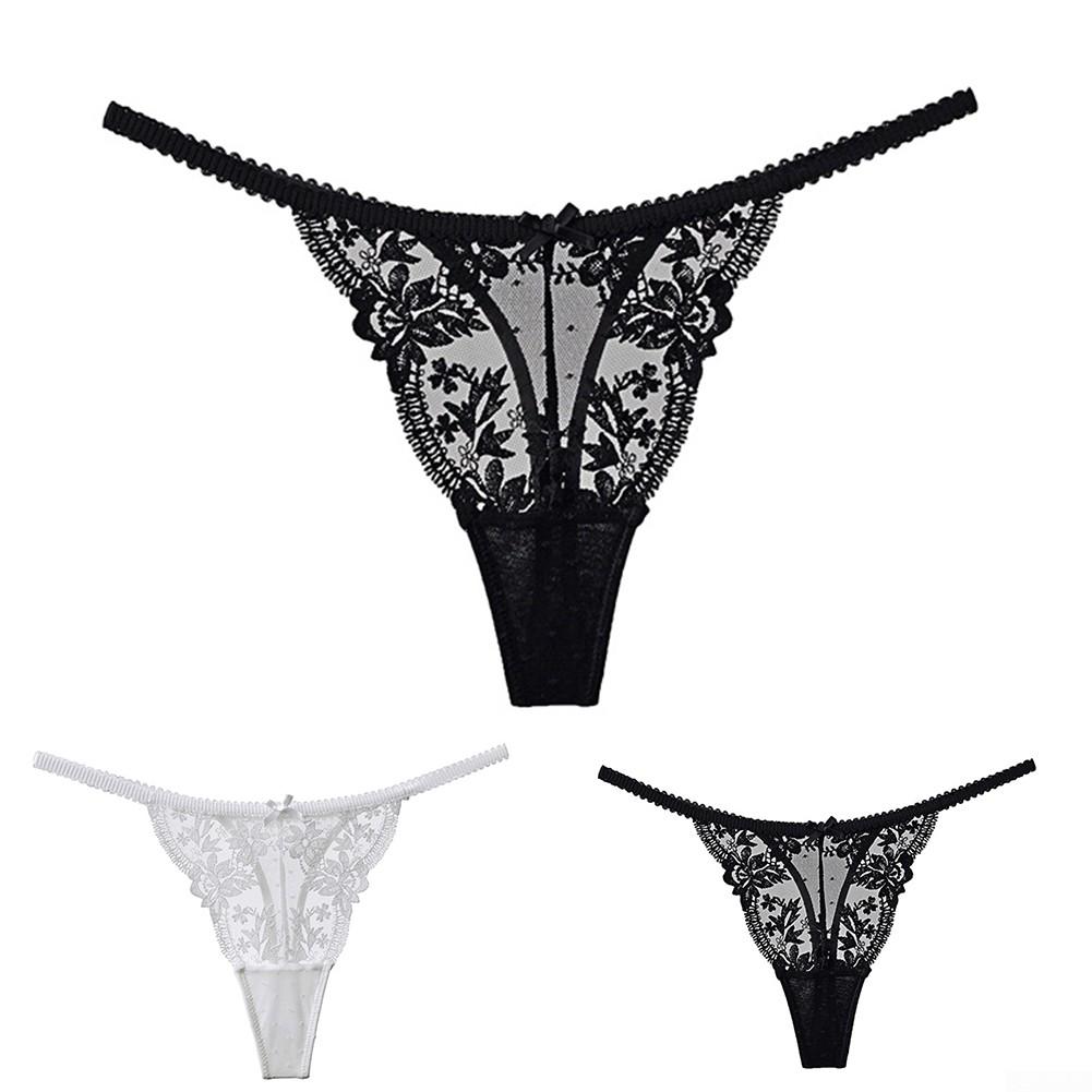 

Женские мини-трусики G-string просвечивают сквозь прозрачные стринги