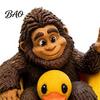Miniature Sasquatch Figure And Duck Figurine, on Swimming Ring Statue, Playful Tabletop Accent Funny Animal Statue for Home Shelf Decor Creative