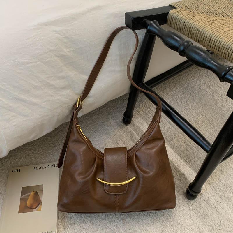 

Korean version of high-value fashion niche armpit bag 2025 autumn new commuter small tote bag women s fashionable leisure bag коричневый