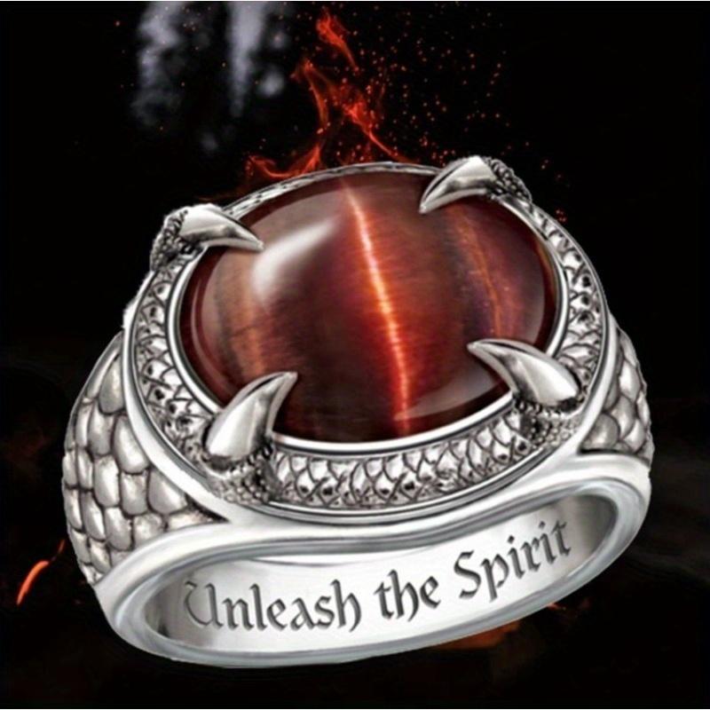 Oval dark stone ring with woven texture. Unique shape, ideal for Western themes—rustic and retro style.