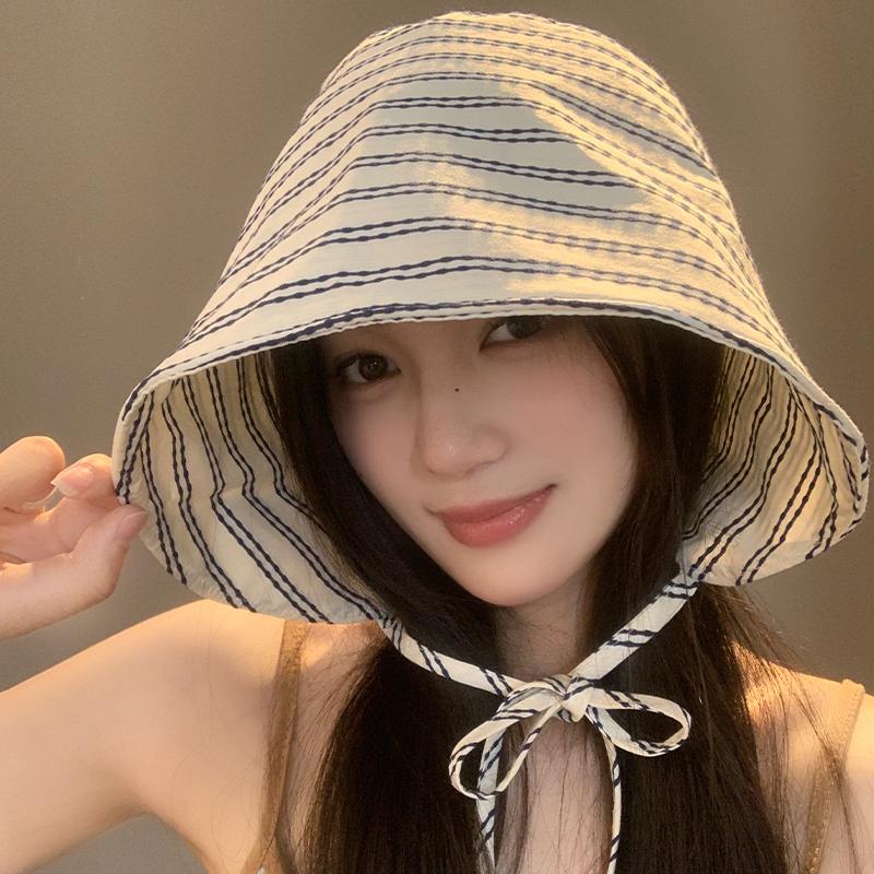 French-style new striped wide-brimmed fisherman's hat for women, summer sun protection, niche breathable hat that makes the face look smaller,
