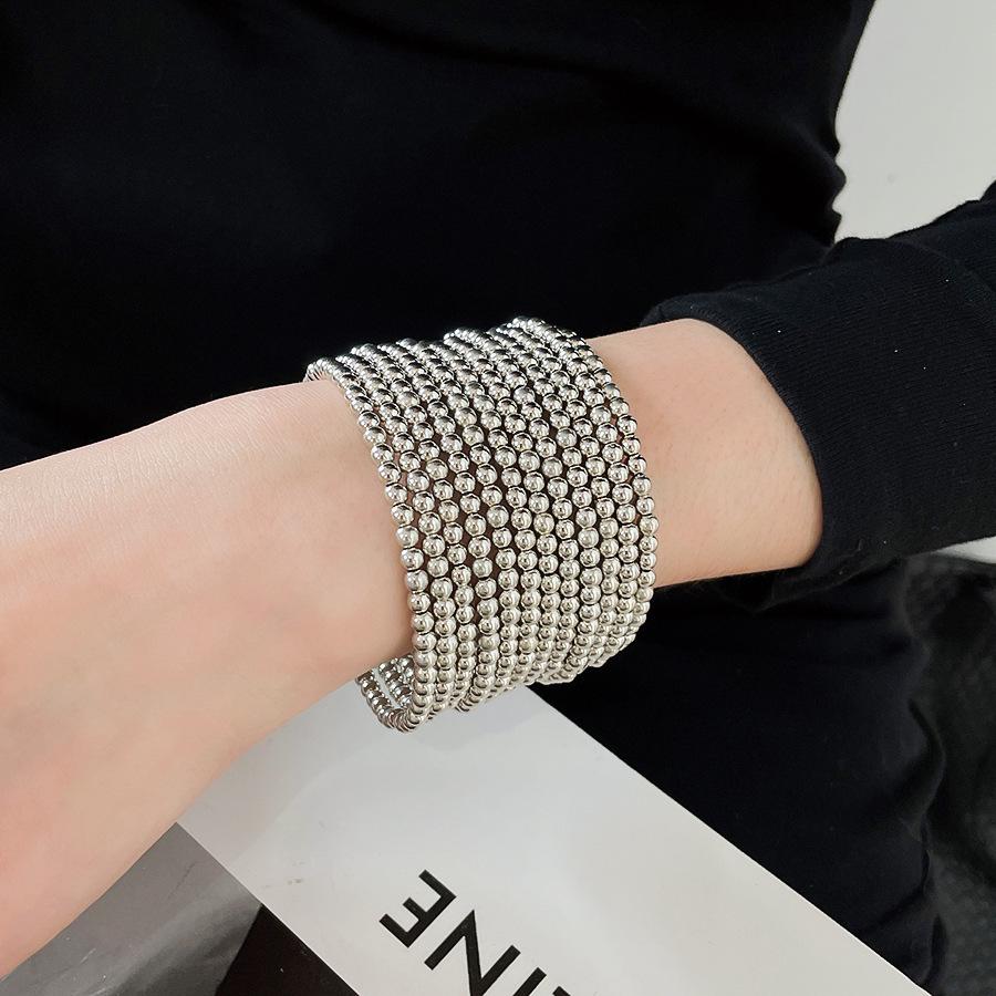 Elegantes mehrschichtiges geometrisches Armband: Luxuriöser, Personalisierter Design- und Kühner Grenzüberschreitender Statement-Schmuck