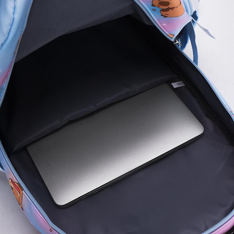 Studentský batoh pro žákyně střední školy s kresleným potiskem