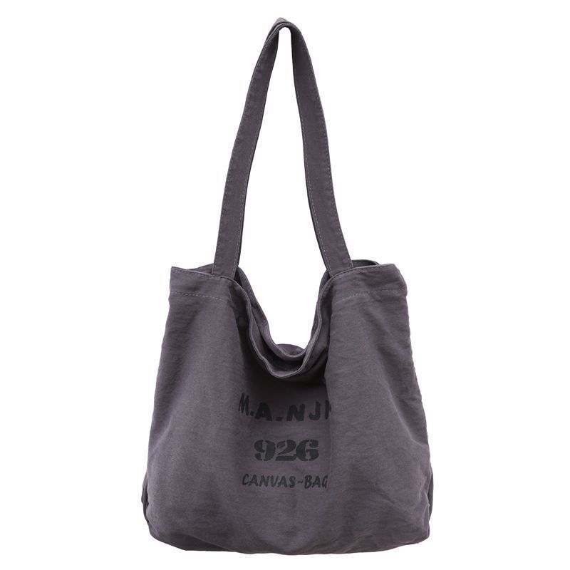 

High value, alphabet canvas bag, Japanese and Korean casual shoulder bag, new large-capacity versatile shopping bag, student bag. Standard