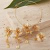 Exquisite 4-Piece Tassel Jewelry Set: Hollow Flower Necklace, Earrings, Bracelet & Ring