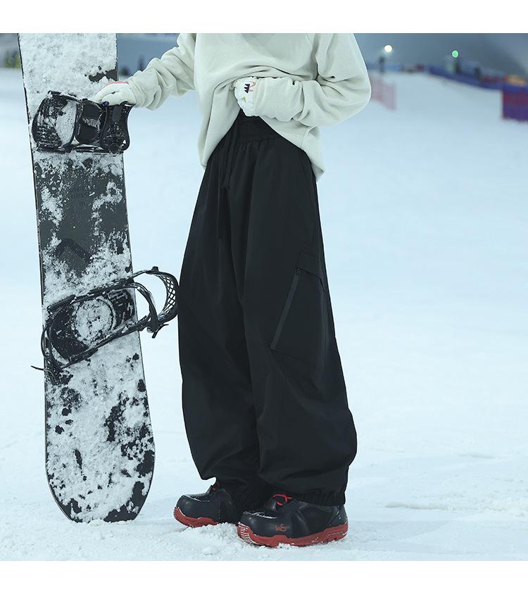 Unisex Waterproof & Windproof Ski Pants for Extreme Cold, Ideal for Northeast China Winters, Mountaineering, and Snowboarding.