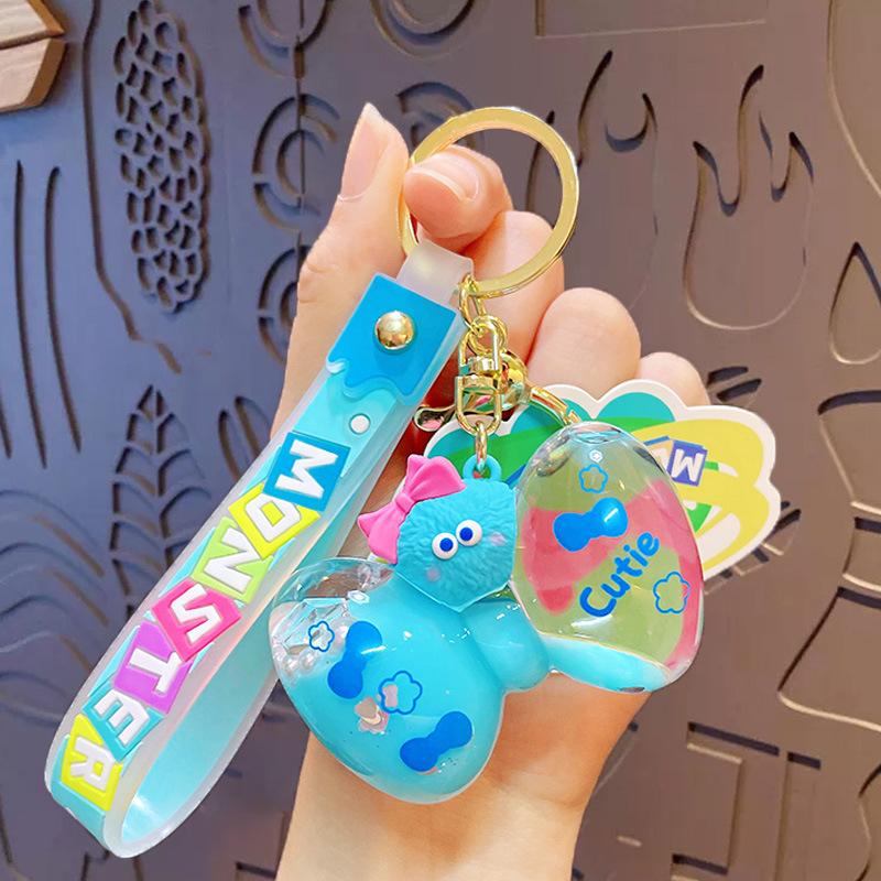Cartoon Cute Little Monster Bow Into Oil Keychain Couple Schoolbag Pendant Car Key Chain Gift Opp bag packaging