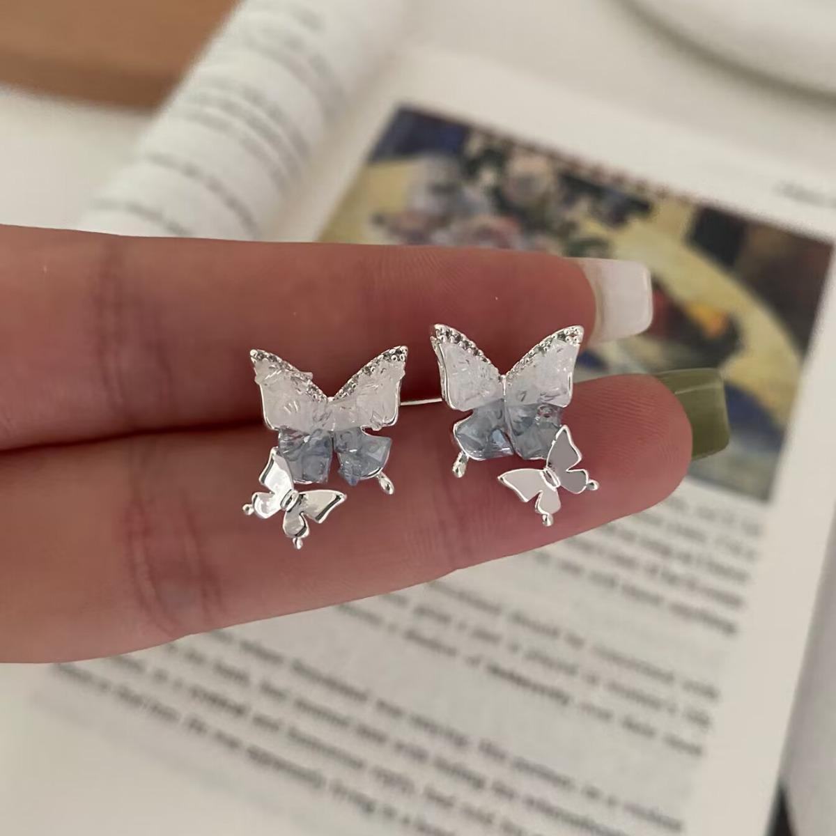Sweet Ice Blue Crystal Butterfly Stud Earrings for Women - Elegant, Versatile & Fashionable.