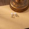 Diamond-Inlaid Gold Leaf Pearl Stud Earrings: French-Style, Luxurious Ear Jewelry for Women.
