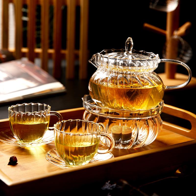 European Glass Tea Infuser Set: Includes Teapot with Filter, Glass Cups, and Saucers for Brewing Flower Tea.