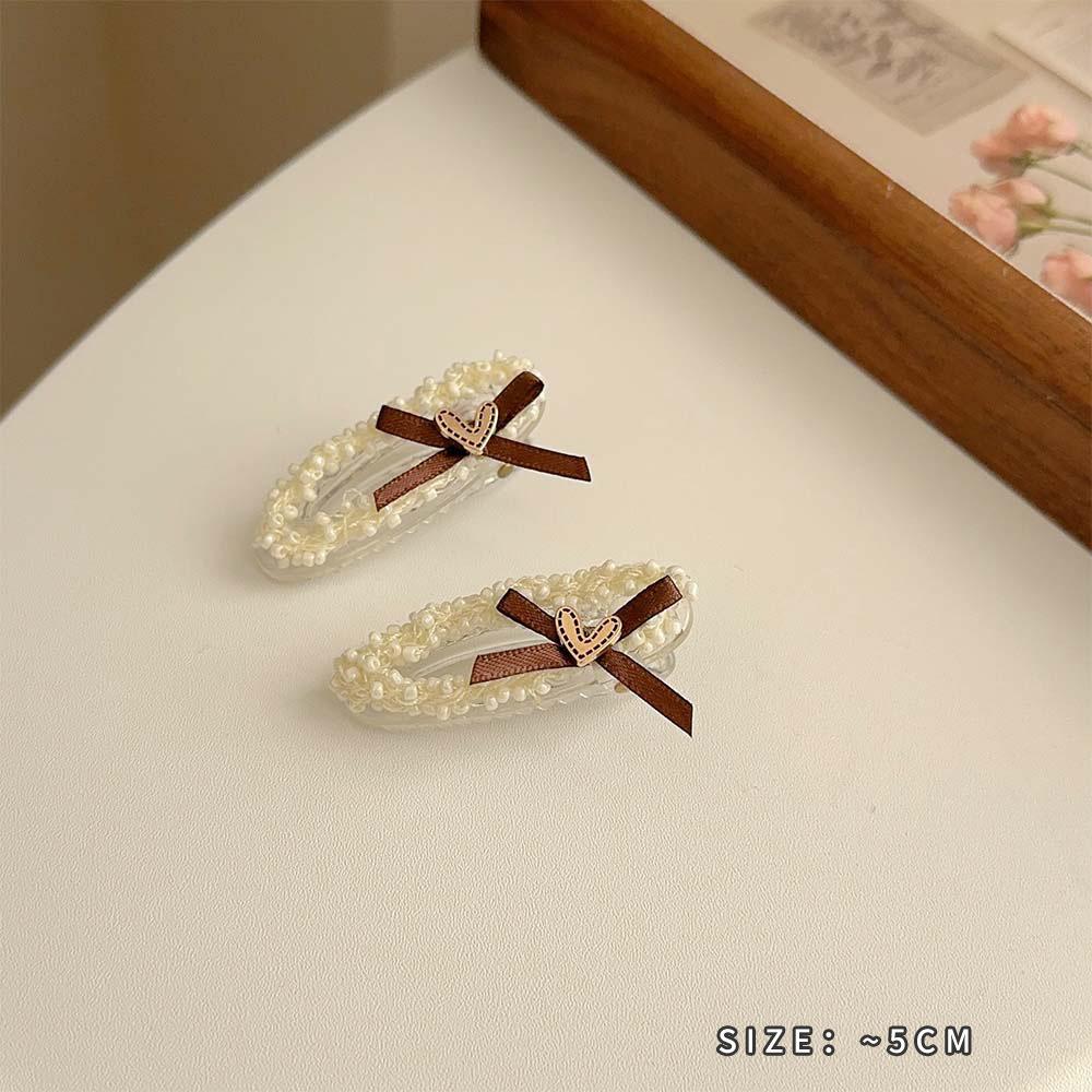 Pearl love bow hairpin rice bead weaving beige series grab clip literary light luxury hair accessories