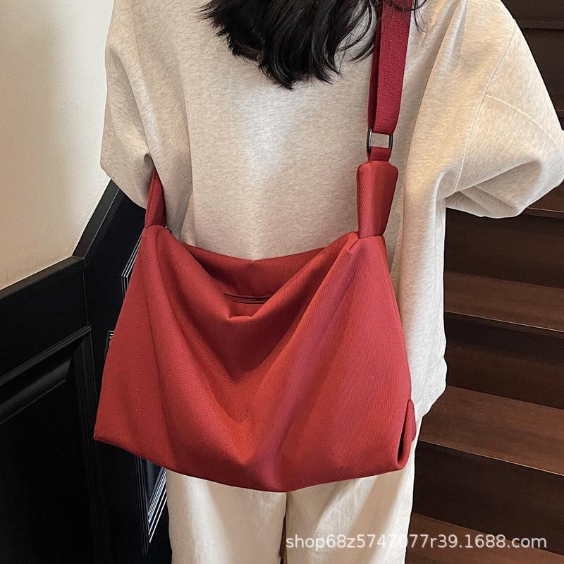 2025 New Canvas Casual Large Capacity Commuter Bag Women's One Shoulder Crossbody Bag Women's Bag Fashionable Versatile Tote Bag