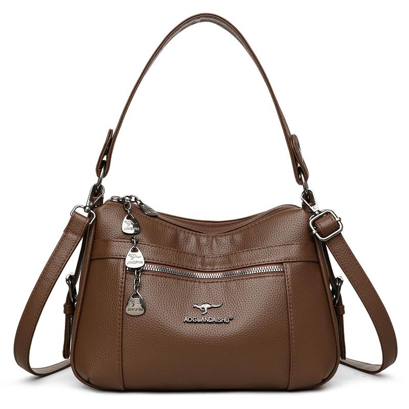 

Cross-border retro soft leather portable shoulder bag middle-aged mother women s bag high-end large-capacity messenger bag темно-коричневого кольору