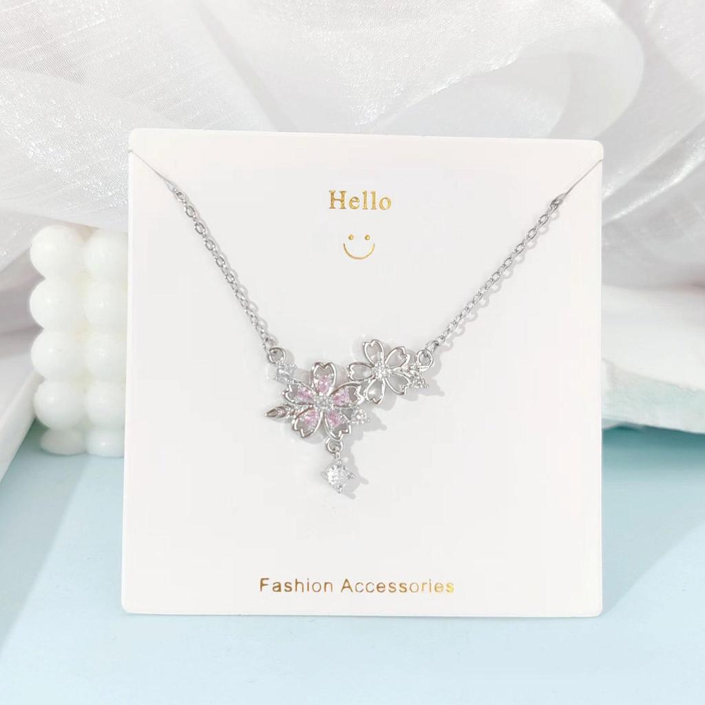 Pink Zircon Gourd Pendant Necklace with Floral Tassels - Titanium Steel Clavicle Chain for Women's Light Luxury.