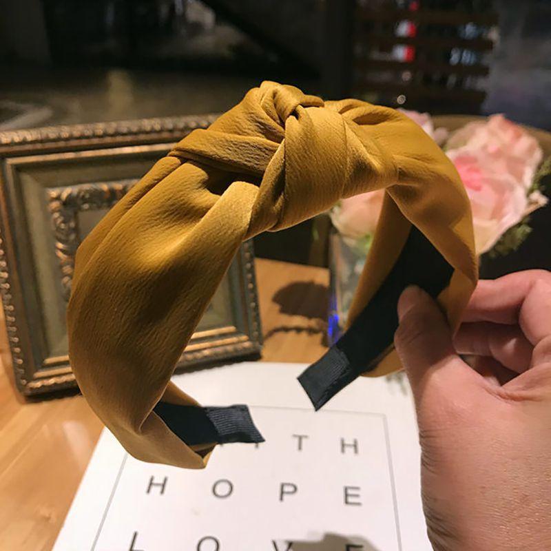 Stylish Women's Cute Hair Band With Twist Band And Wide Brimmed Design For Effortless Chic