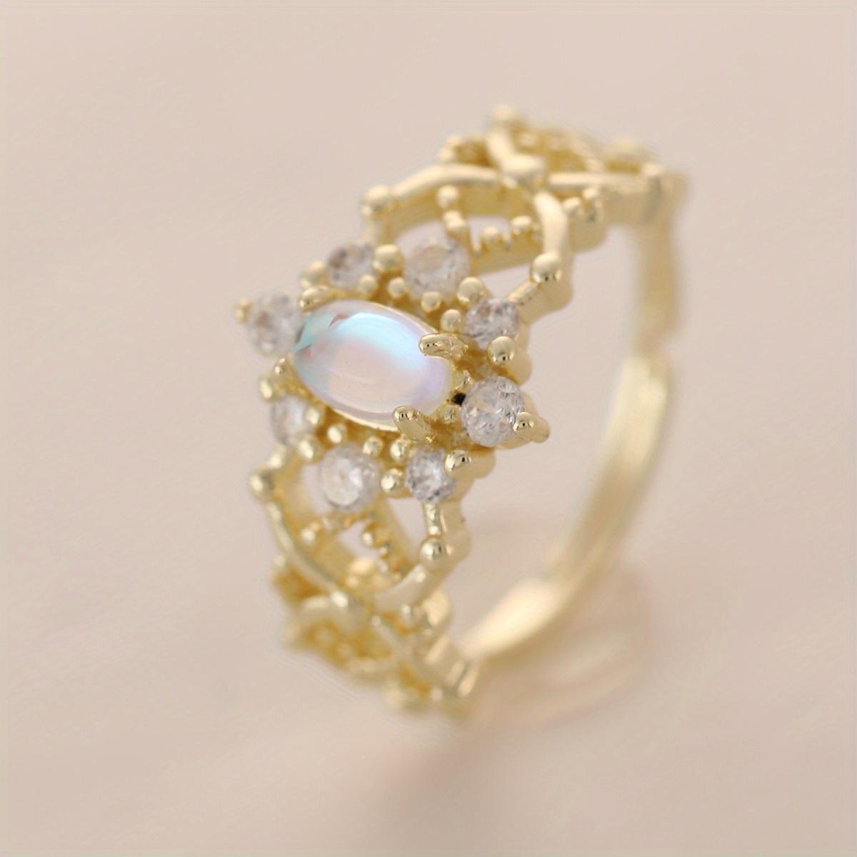 

Кольцо из латуни с покрытием из 14-каратного золота, регулируемое, открытое, для женщин, с полым листовым дизайном, с кубическим цирконием и синтетическим опалом, элегантные подарочные женские кольца One Size (Adjustable) золотистый