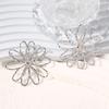 New exaggerated and fashionable hollow versatile alloy flower stud earrings, creative and simple daily commuting models