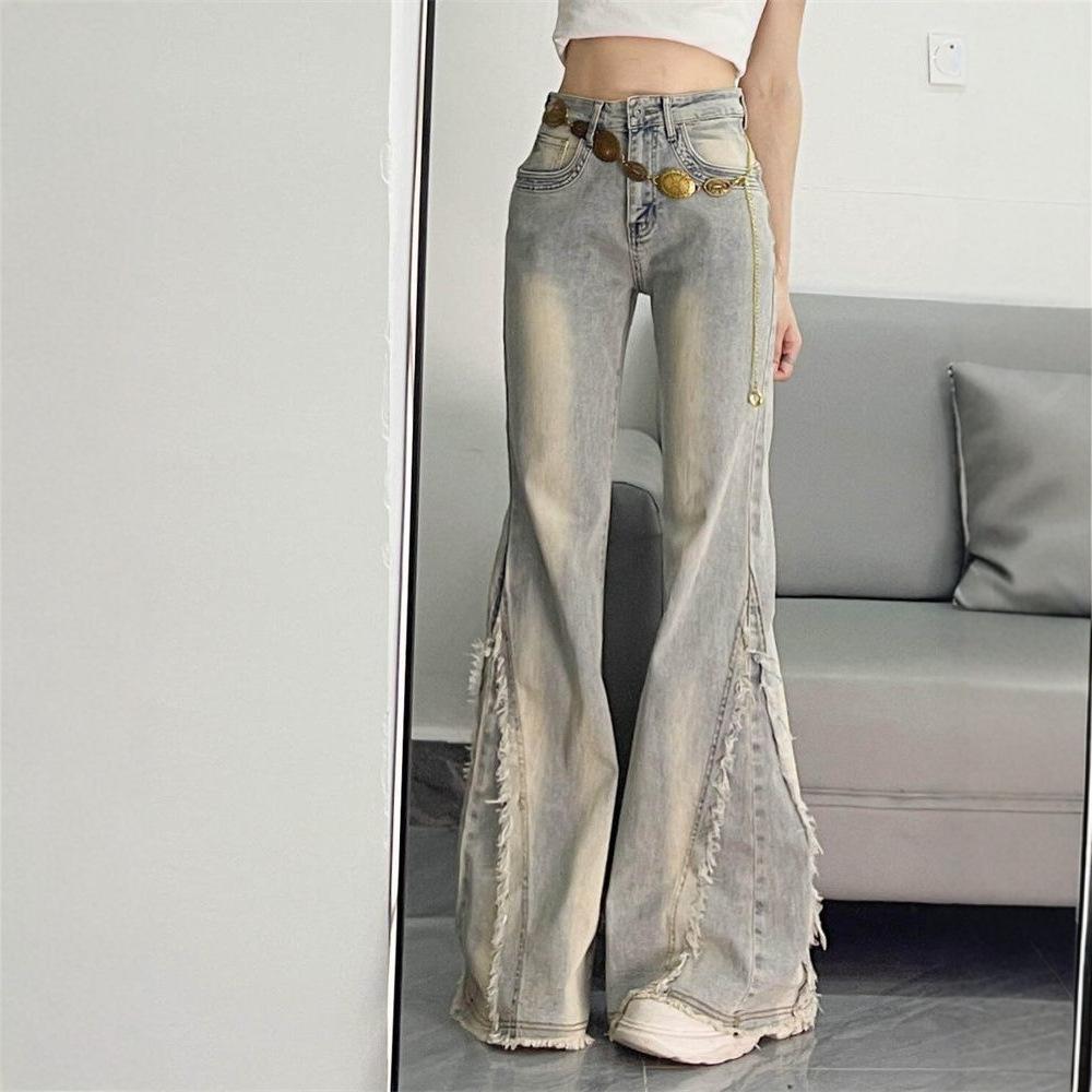 American retro micro-pull jeans women's 2026 spring and summer new rough edge splicing design sense slim and thin horseshoe pants