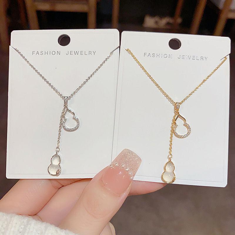 Exquisite 2025 Niche Double Gourd Tassel Necklace - Trendy Light Luxury Clavicle Chain for Women Gold Hollow Tassel Necklace
