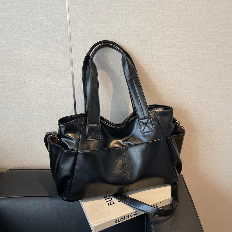 Retro large-capacity bag women's spring and summer new simple messenger bag casual and light commuter tote bag