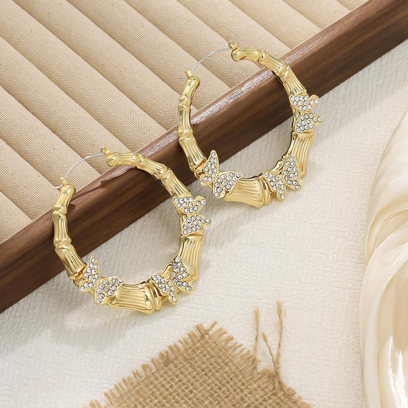 Fashion temperament exaggerated earrings, personalized butterfly diamond-set circle earrings, stud earrings for women