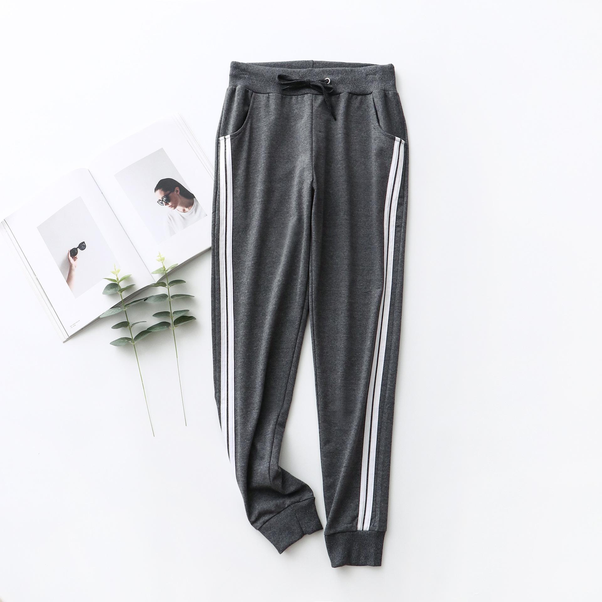 

Спортивні штани унісекс у дві смужки на весну/осінь - ідеально підходять для бігу, спорту та студентів M темно-сірий колір