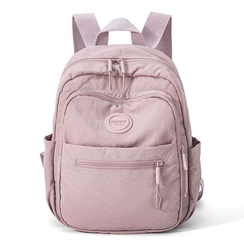 

Нейлоновий рюкзак Жіночий рюкзак великої місткості Легка дорожня сумка світло-фіолетового кольору