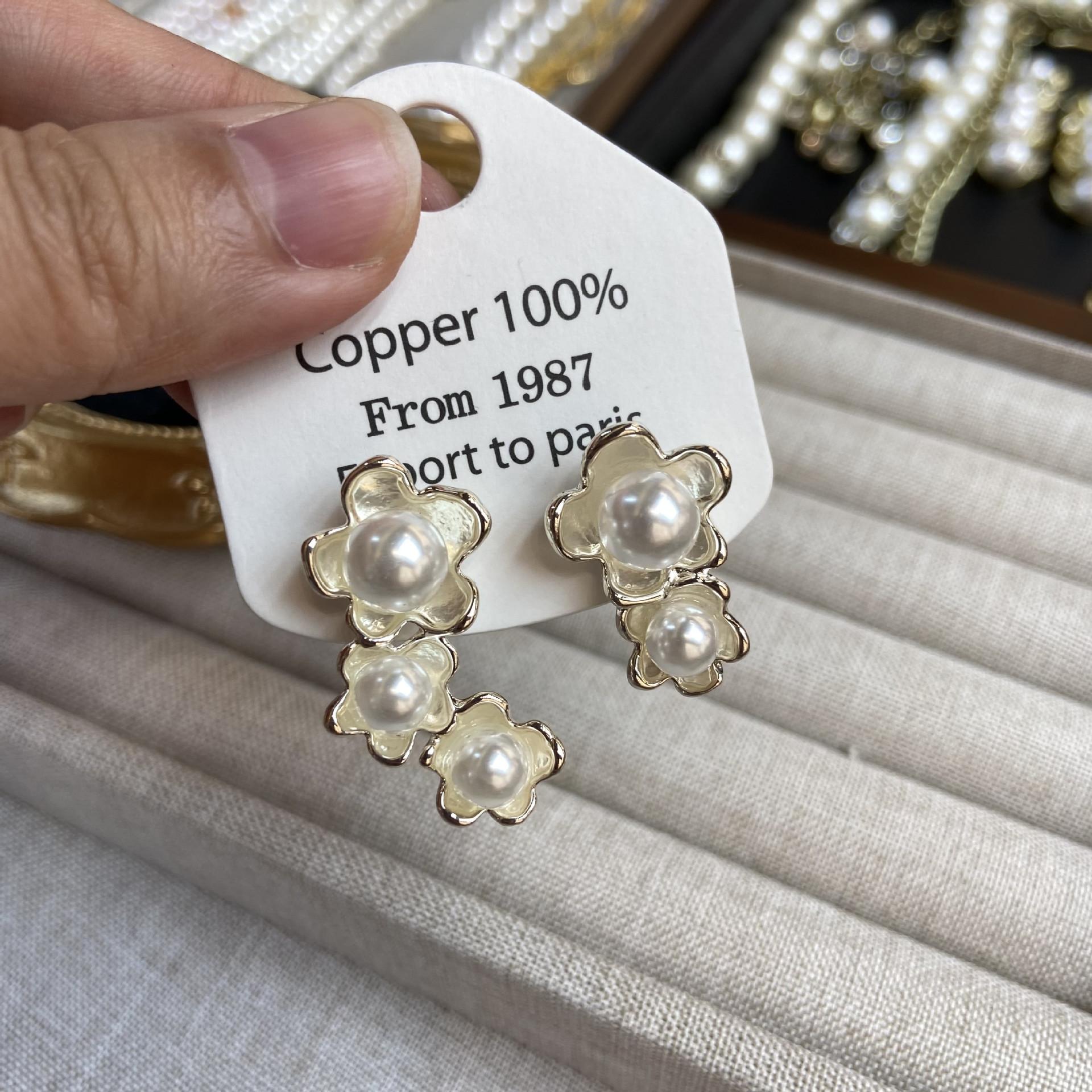 White Pearl Plum Blossom Earrings Retro Handmade Light Luxury Elegant And Exquisite