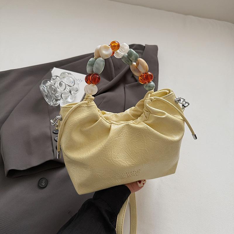 New Chinese bag women's handbag 2025 new summer fashion niche casual bucket bag beaded messenger bag