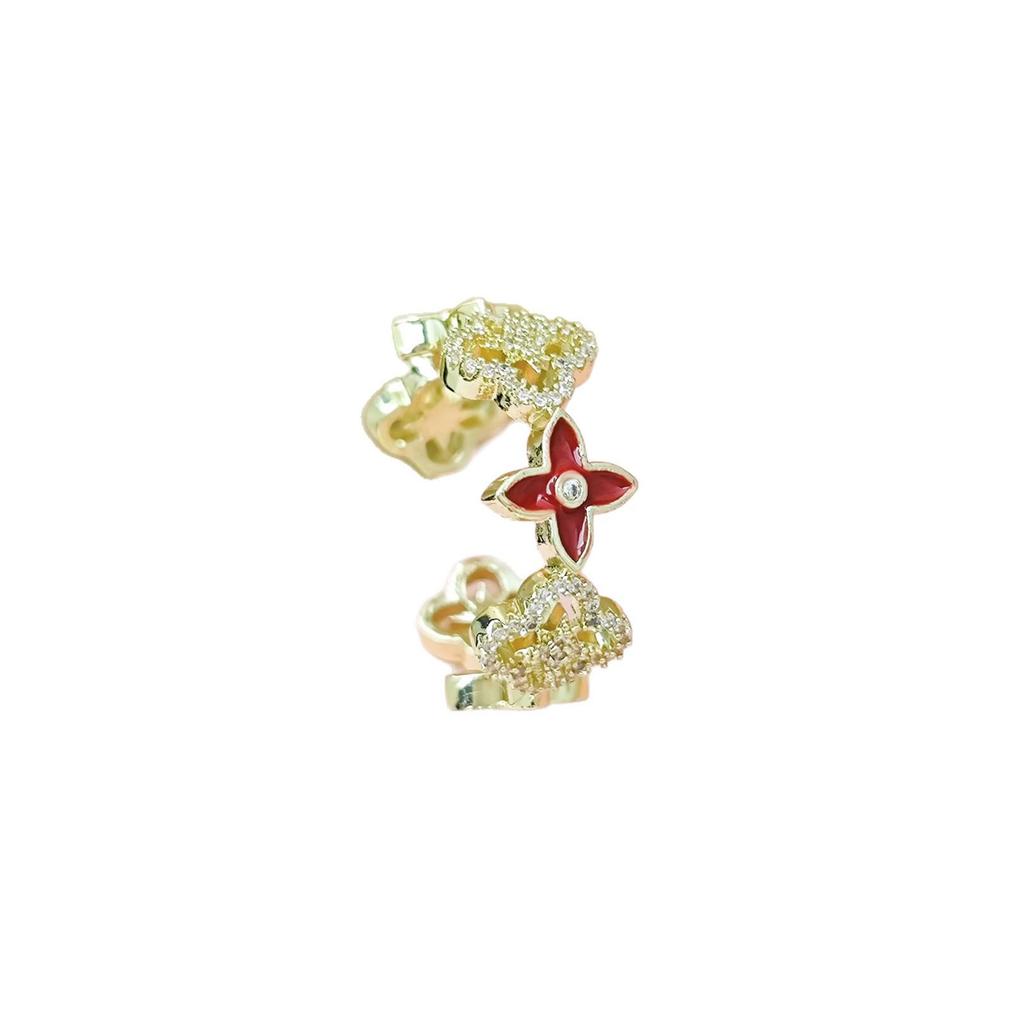 Korean Style Four-Leaf Clover Ring for Women - Elegant, Intricate, Classic Design, Versatile Flower, Open Adjustable, Light Luxury Accessory.