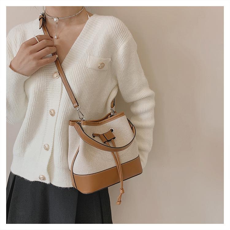 Dámské tašky Evropské a americké tašky Diagonální tašky Šňůrka Splicing Plátno Přenosné kbelíkové tašky