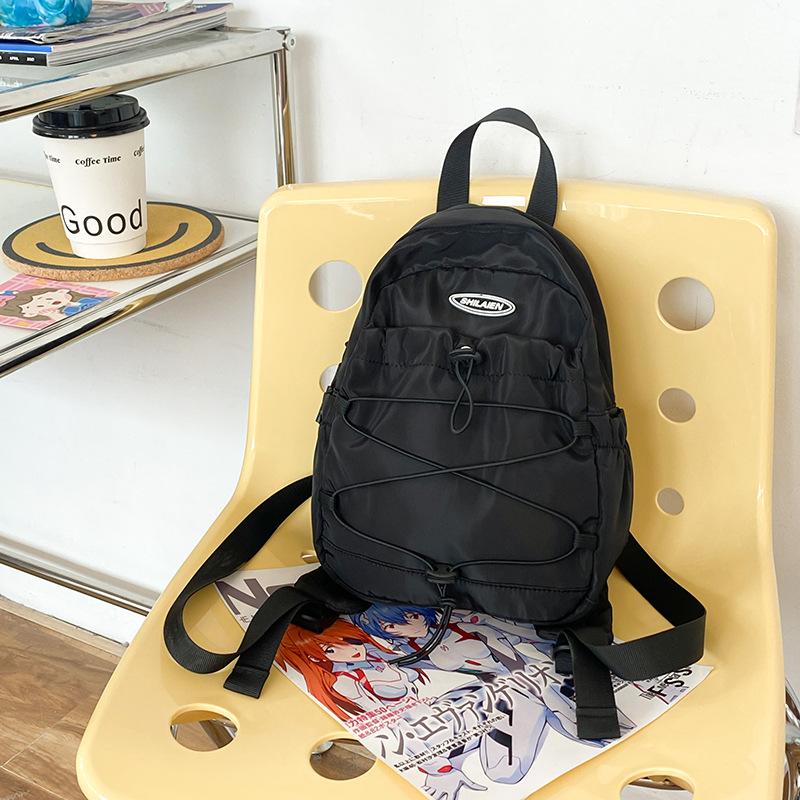 Outdoor travel bag mini fashion small backpack new Korean light boys and girls backpack junior high school hiking bag