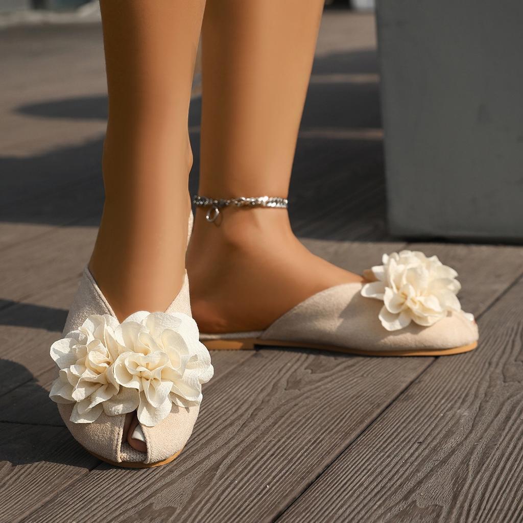 2025 summer hollow Korean version flat bottom outer wear half slippers women's flower casual bag head solid color slippers