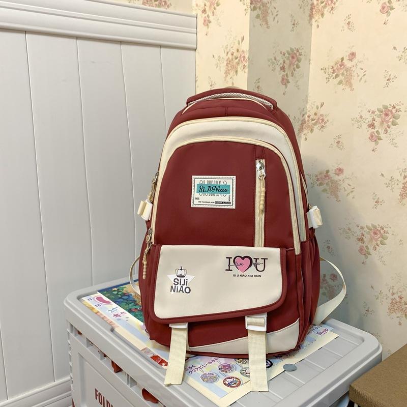 

Women s 2025 new simple niche versatile contrasting color student schoolbag multi-compartment large-capacity backpack single pack. бордовый