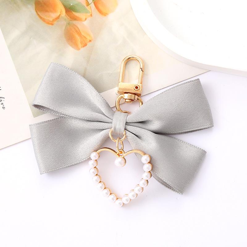 Creative Pearl Bow Pendant Keychain: Exquisite Gift Accessory for Bag or Phone Case