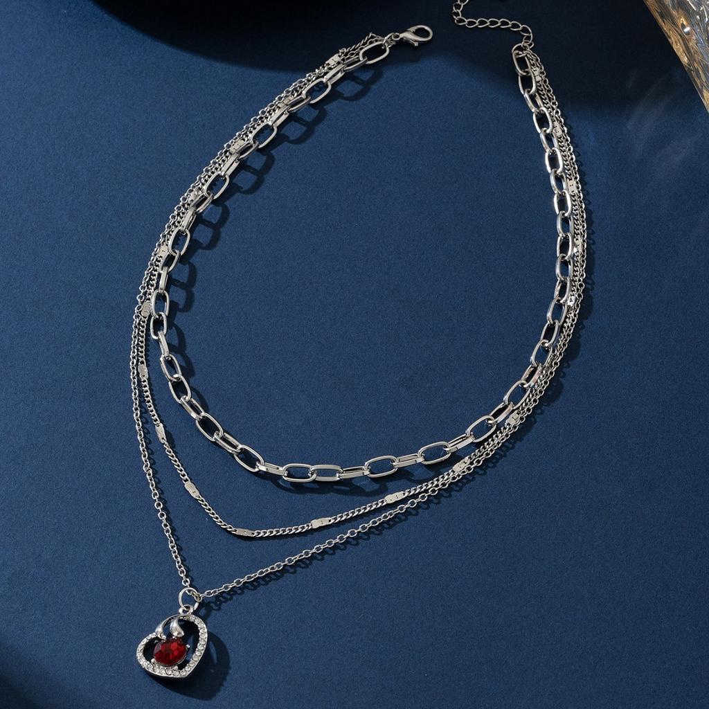 Multi-layer necklace, love hollow inlaid with ruby temperament, high-end autumn and winter layered sweater chain, hot sale