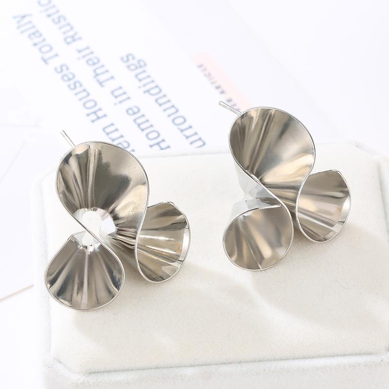 

New European Women s Twist Stud Earrings Creative Personality Gold Color Wild Geometric Earrings Alloy Spiral Irregular Zircon